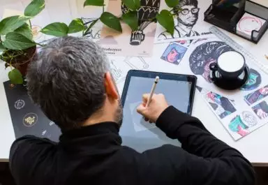 Ripple's Illustrator at work - drawing on a tablet