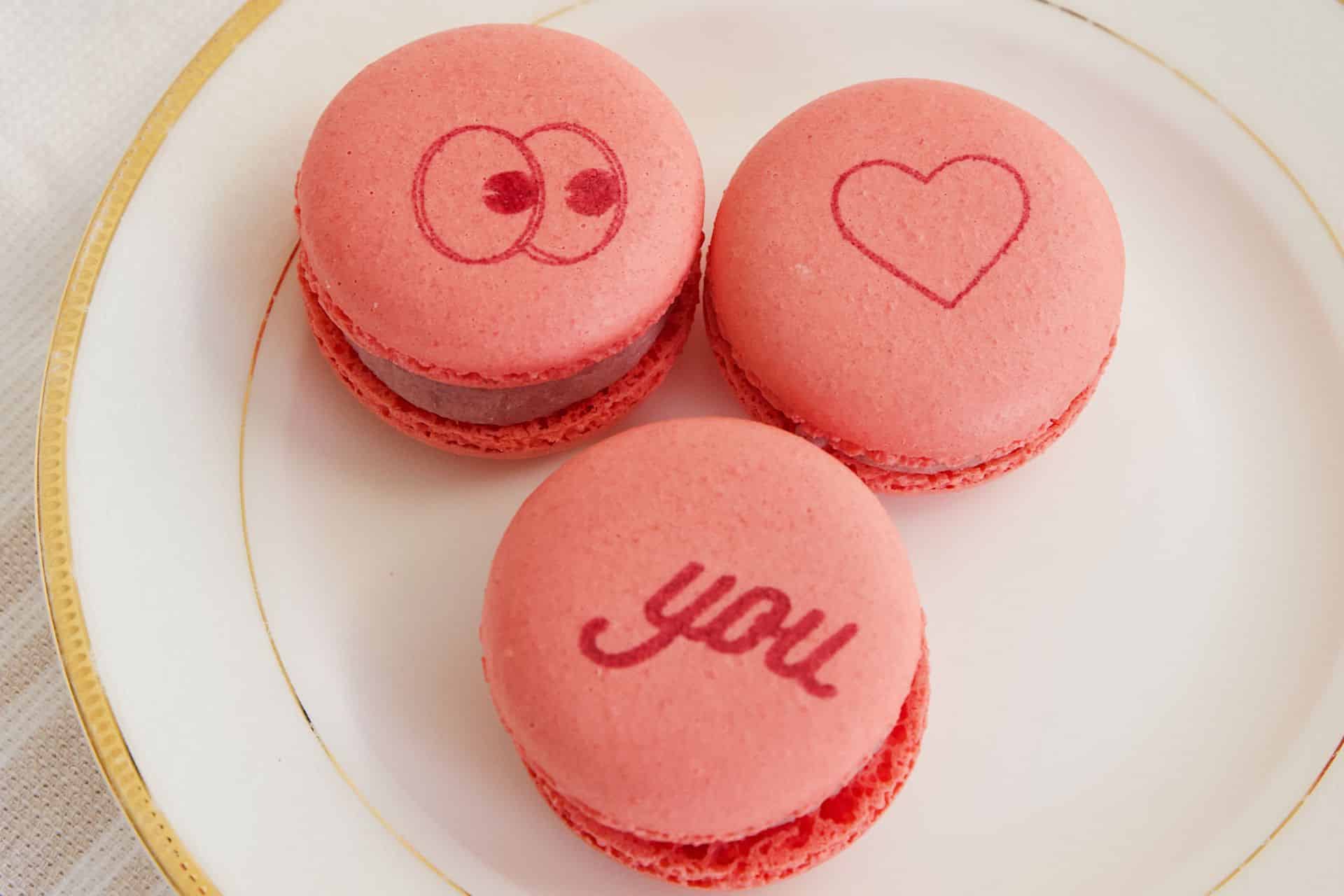 Macarons printed with a dessert printing machine that say I love you